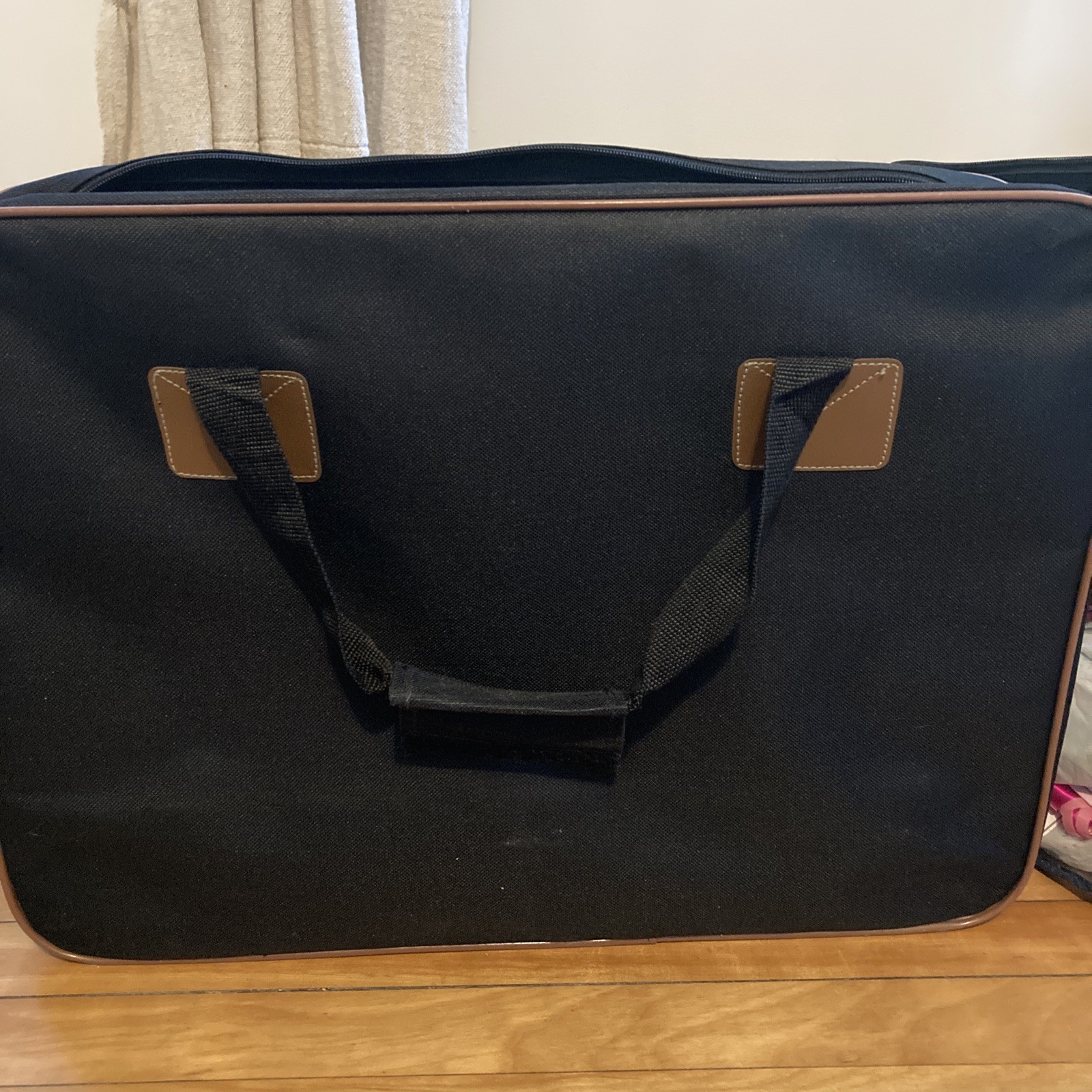 Vintage women’s black travel carry on luggage