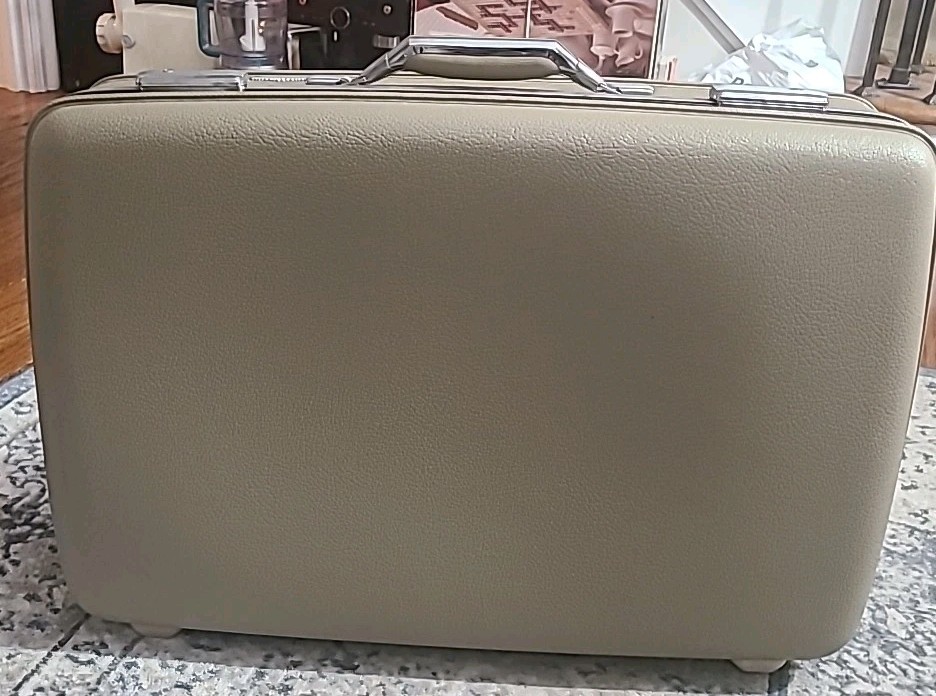 Vintage American Tourister Tiara Beige Suitcase. No keys. 23″X16″X6″.