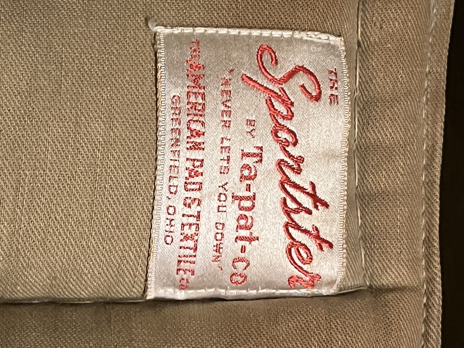 vintage quilted life vest, likely from the 1930s or 1940s, “Sportster”.