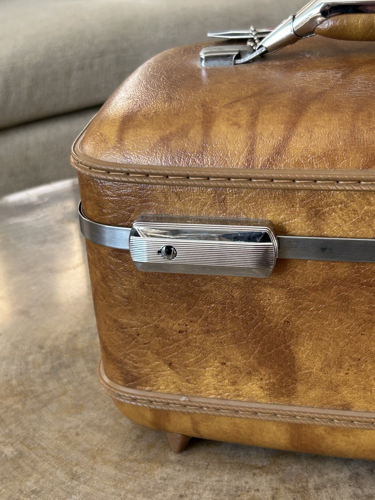 Vintage American Tourister train case in marbled brown leather