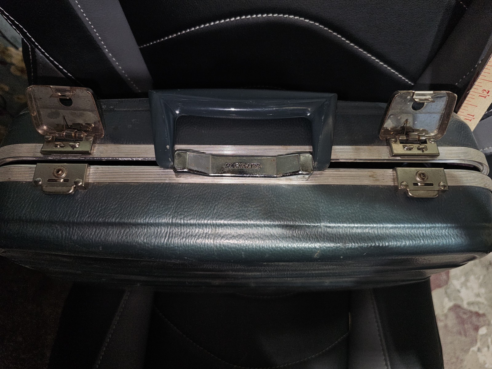 vintage Magnalite green hardcover overnight suitcase, lined with key.