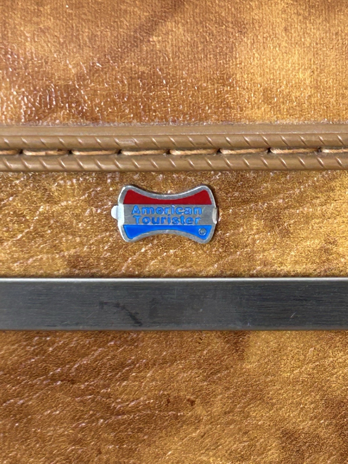 Vintage American Tourister train case in marbled brown leather