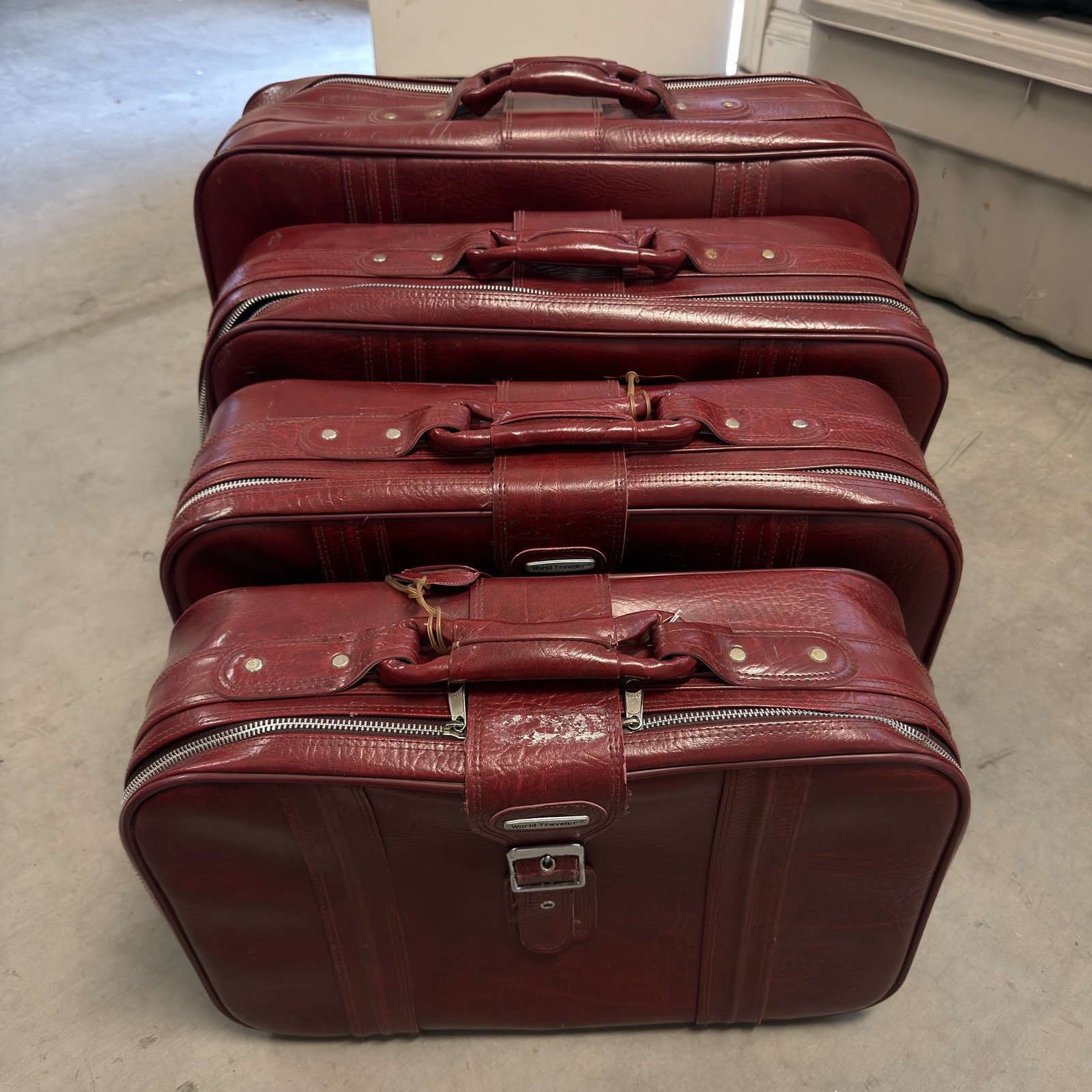 Vintage World Traveler 4 Piece Burgundy Red Leather Travel Suitcase Luggage Set