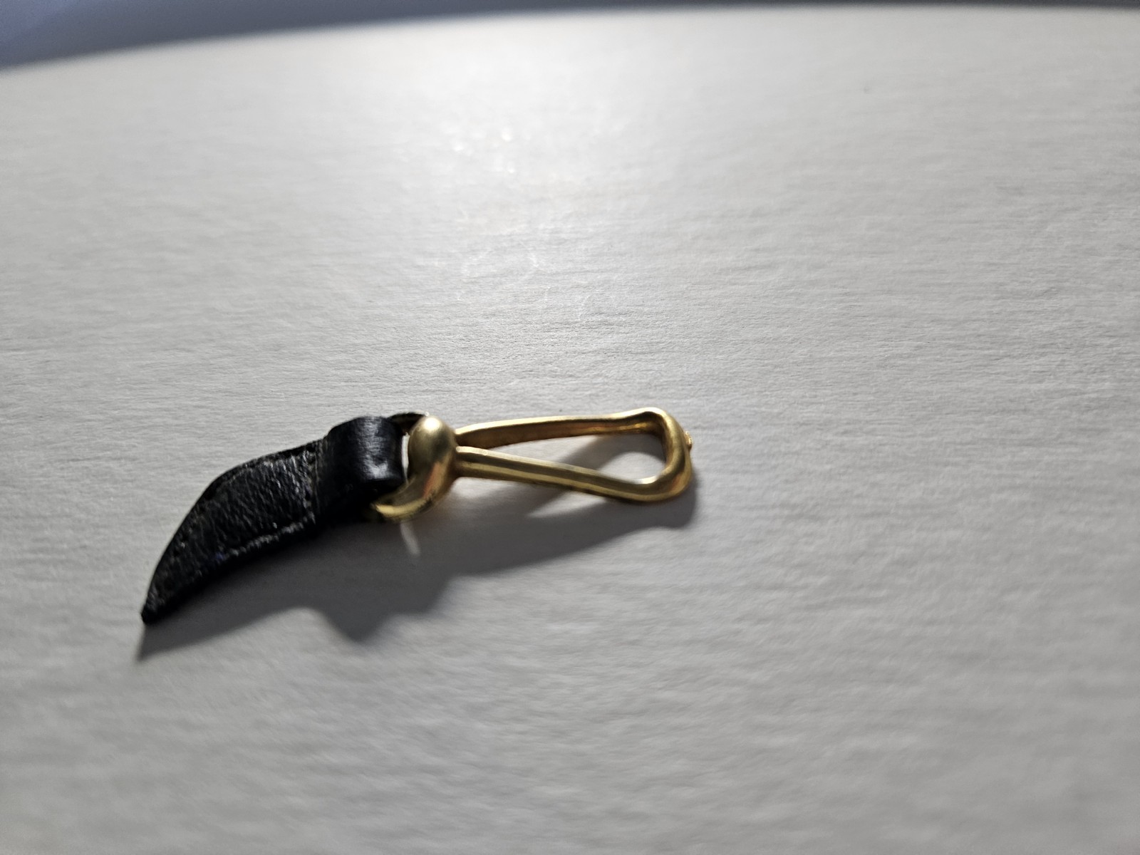 Vintage Sebastian SA MOD. REG. 707 Gold-Tone Luggage Tag on Black Leather Strap