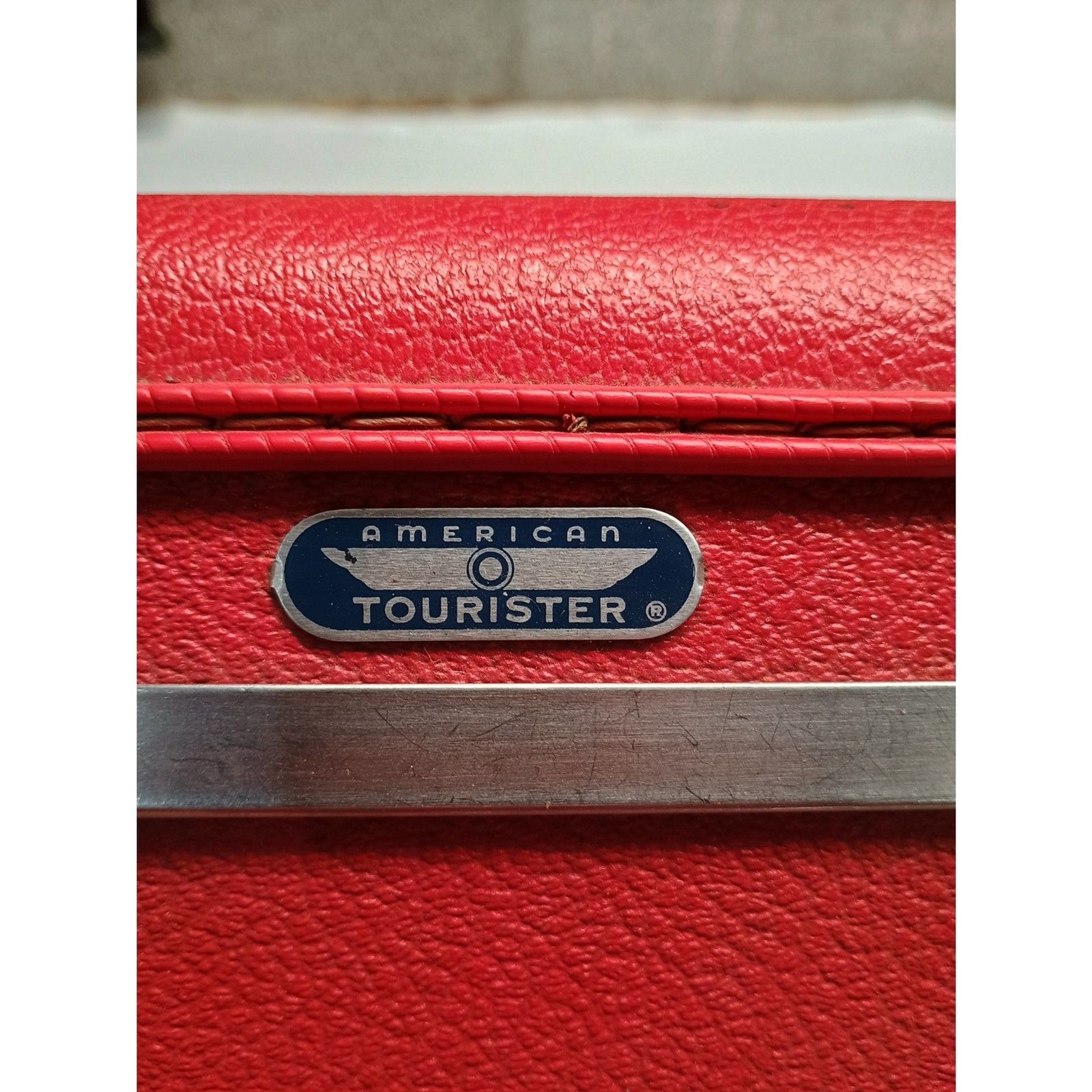 Vintage Red American Tourister Tiara 21in suitcase with key