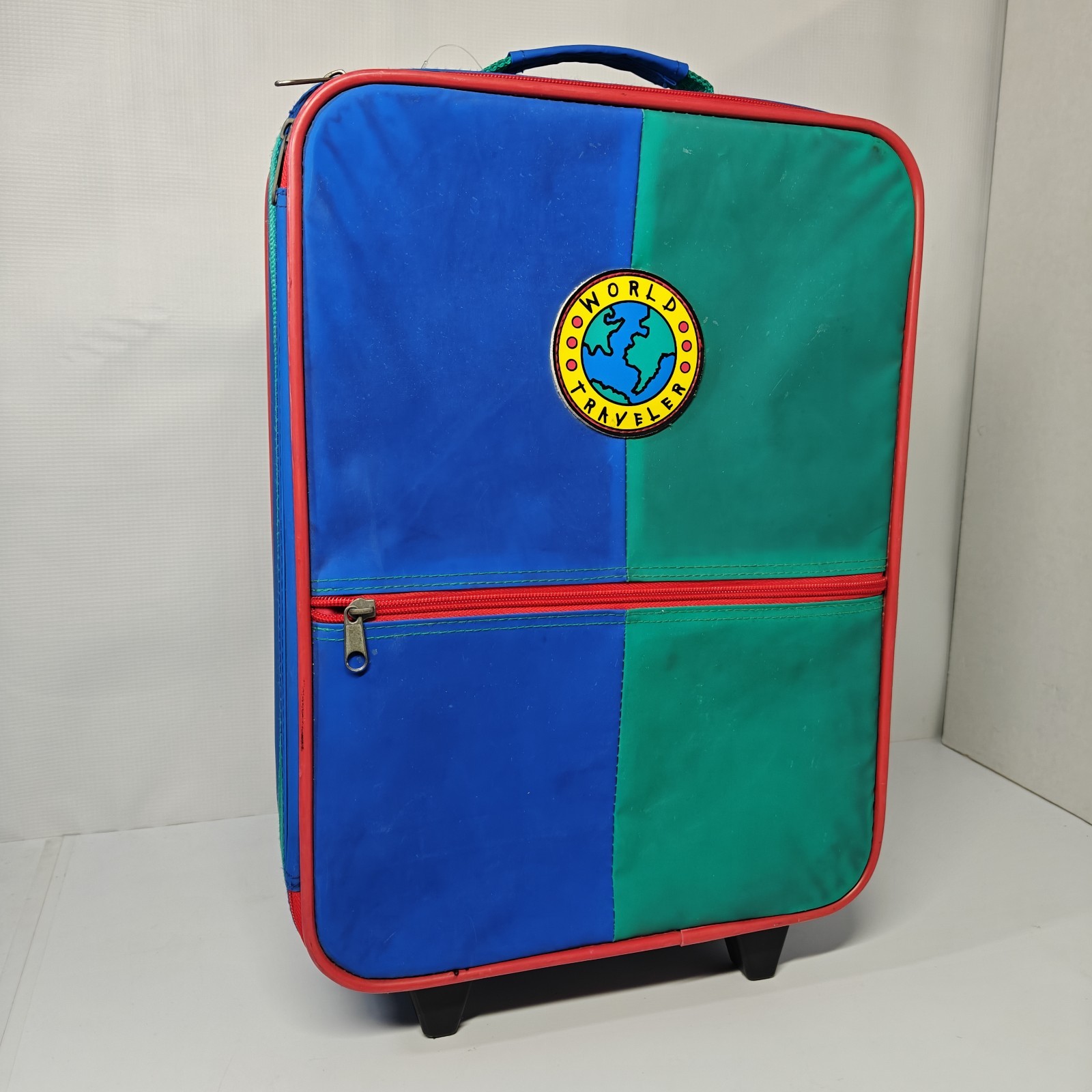 vintage World Traveler rolling suitcase