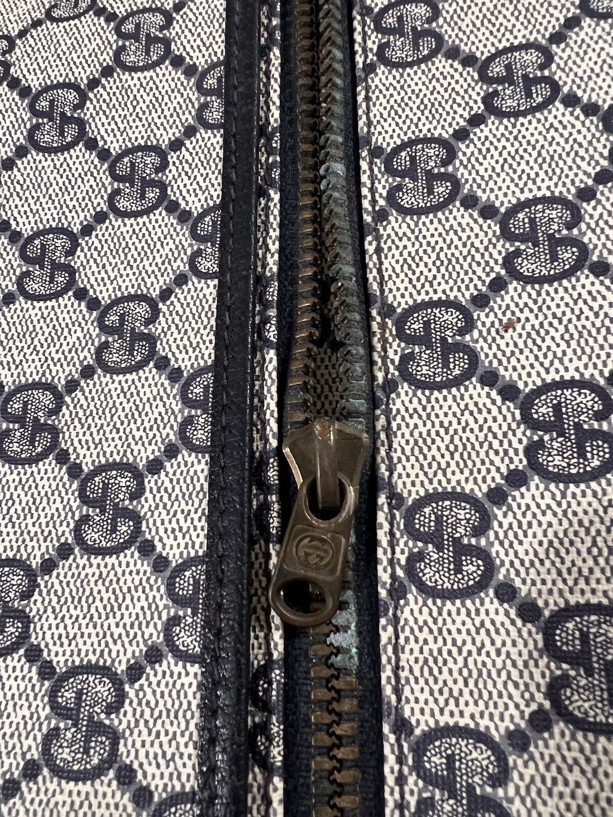 True vintage Gucci garment bag.