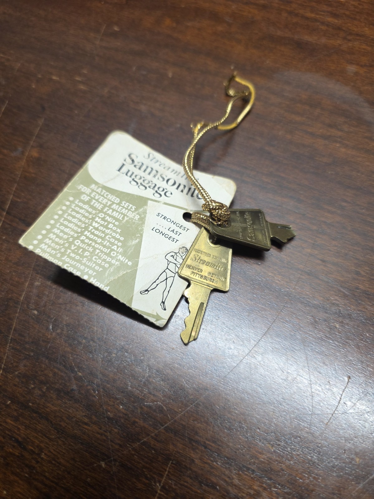 vintage Samsonite Streamlite luggage tag and key 1950s.