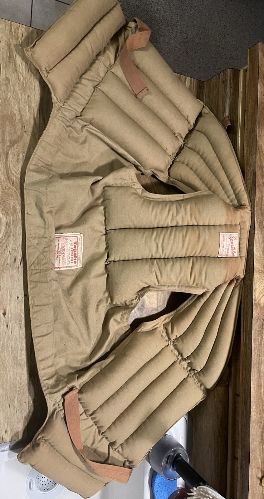 vintage quilted life vest, likely from the 1930s or 1940s, “Sportster”.