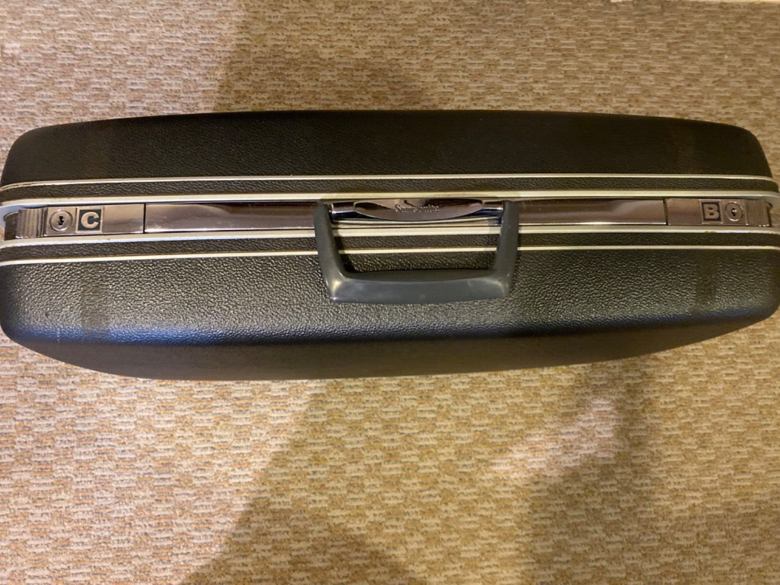 Vintage Samsonite Dark Gray Hardshell Suitcase Approximately 26 Inches Wide Key