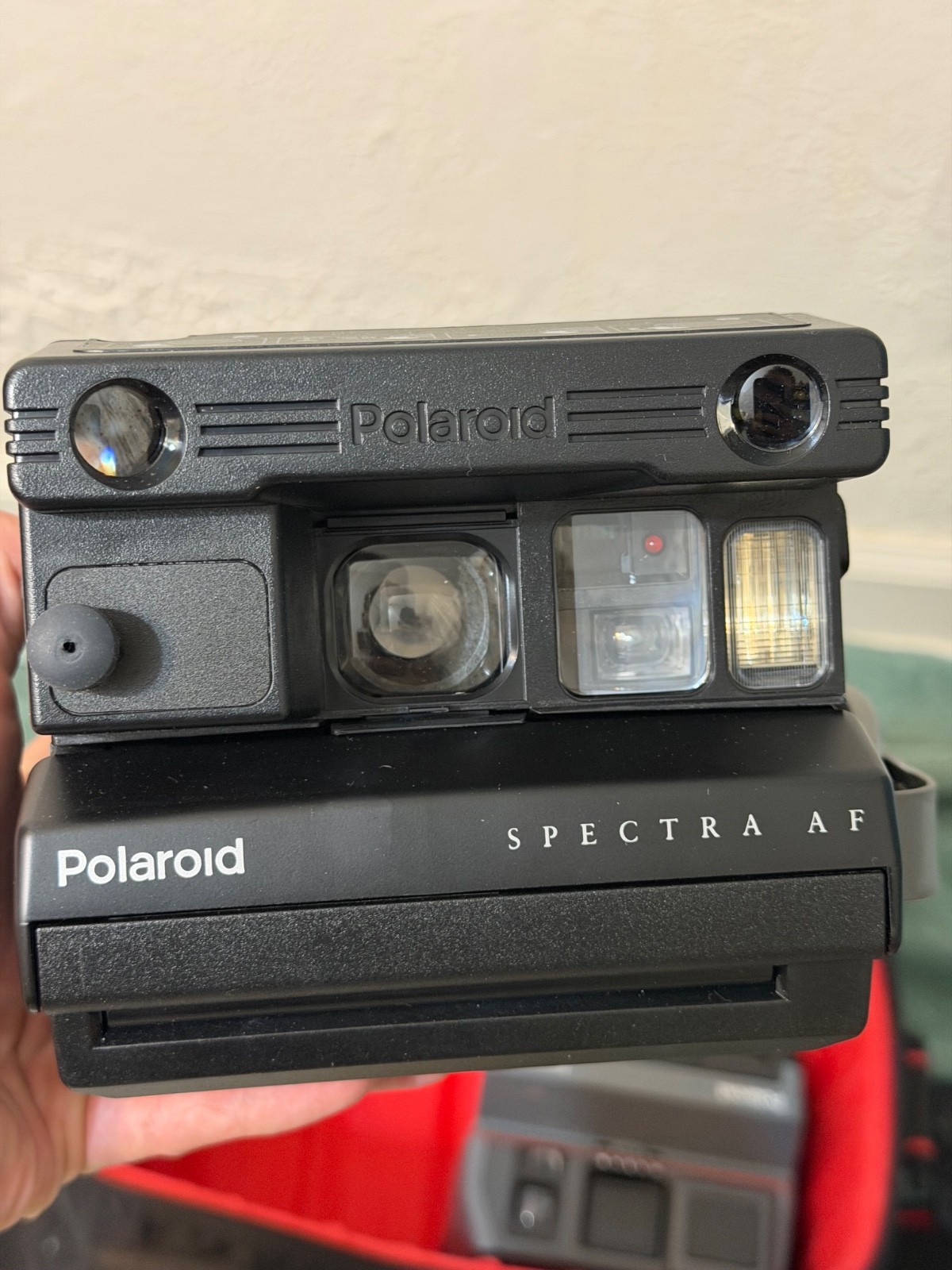 vintage polaroid starter bundle with black and red carrier case