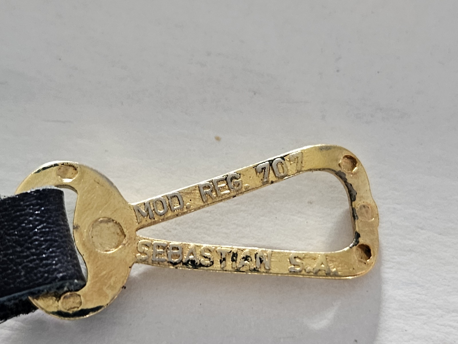 Vintage Sebastian SA MOD. REG. 707 Gold-Tone Luggage Tag on Black Leather Strap