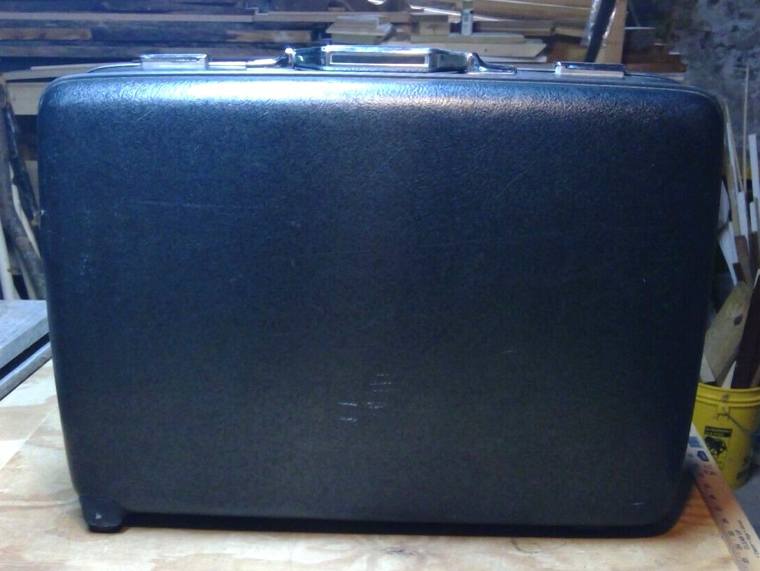 American Tourister Vintage “Tourister Style Rolling Suitcase