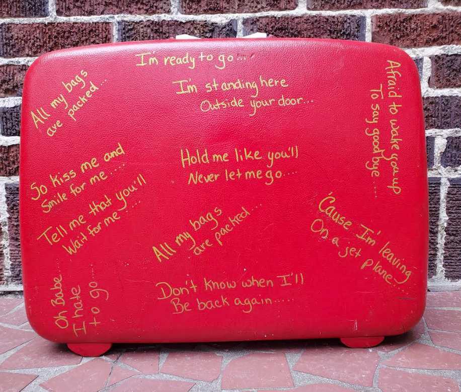Vintage red Samsonite suitcase with custom paper mache design