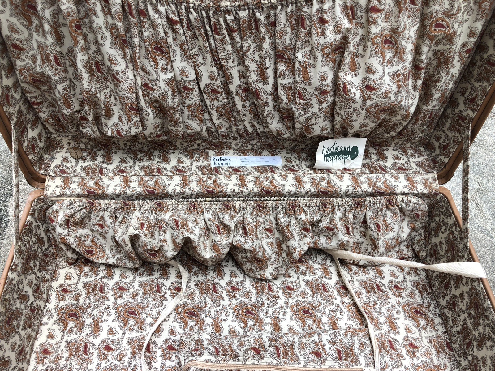 Hartmann 25” Belting Leather Paisley Interior Suitcase