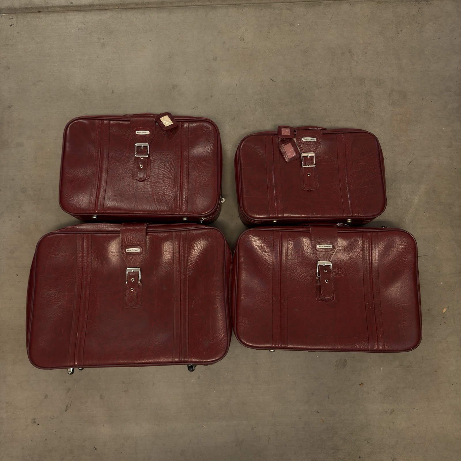 Vintage World Traveler 4 Piece Burgundy Red Leather Travel Suitcase Luggage Set