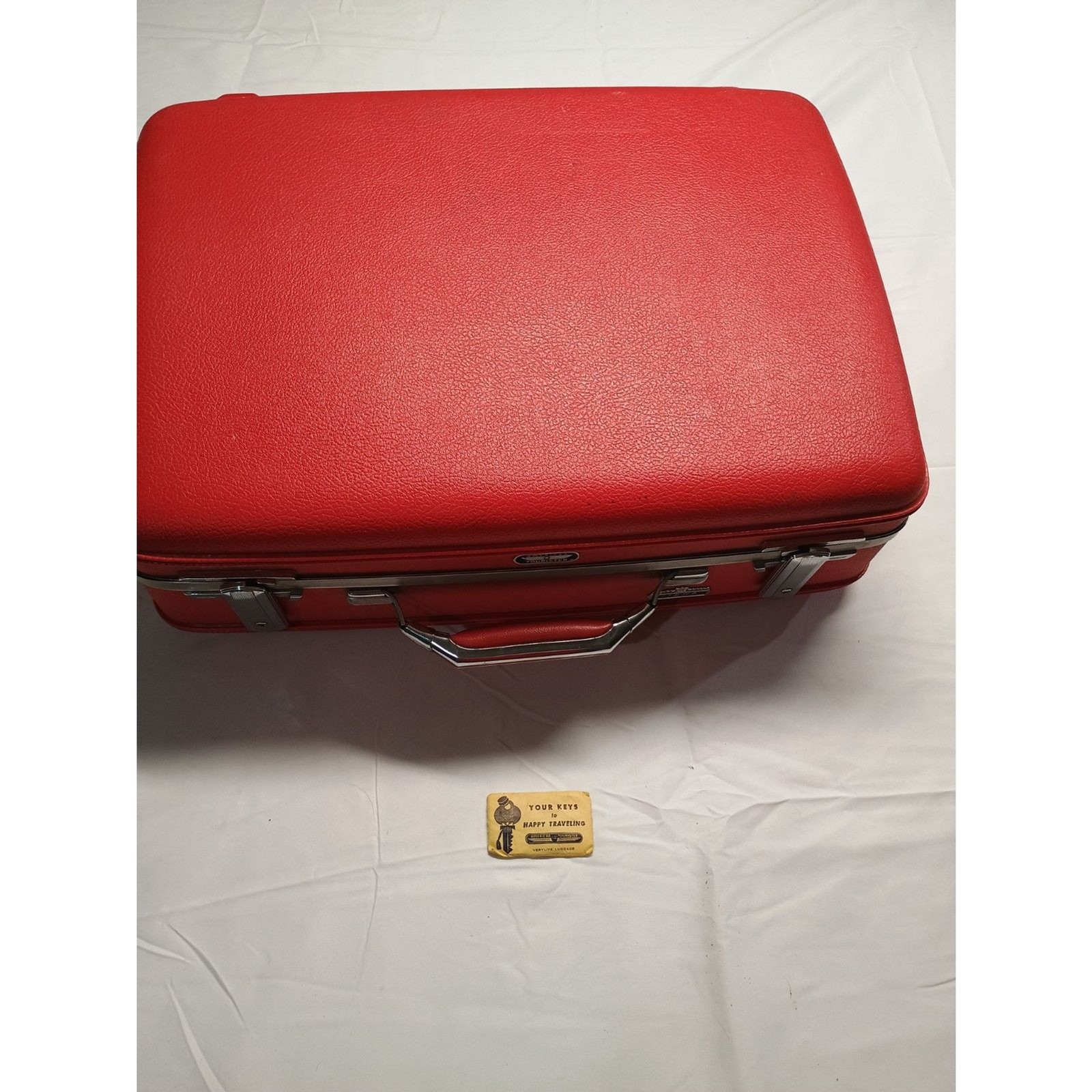 Vintage Red American Tourister Tiara 21in suitcase with key